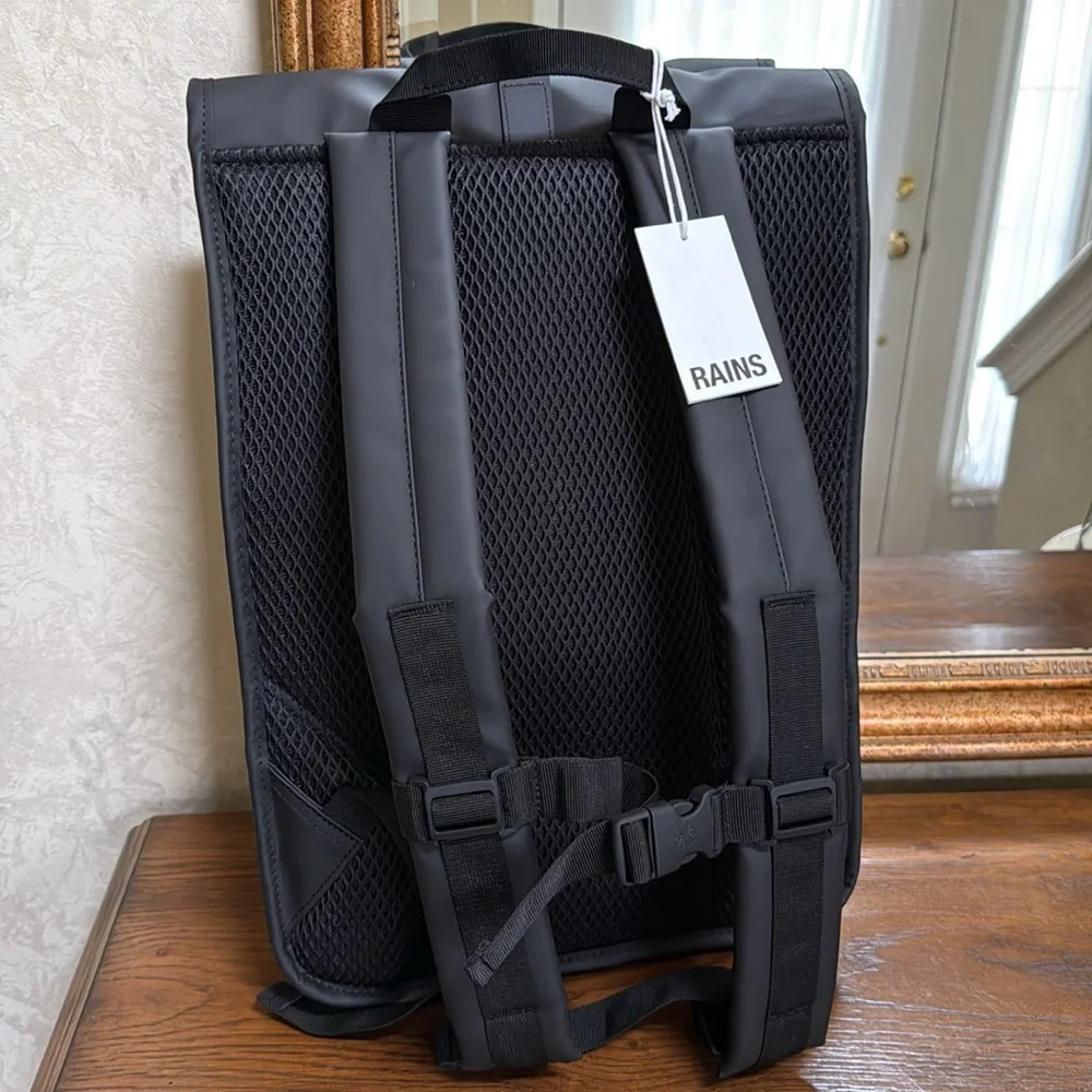 New Rains Black and Gray Unisex camo look Backpack.